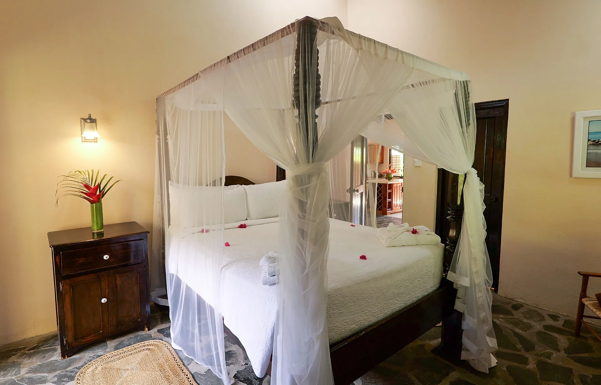 Canopy bed in Bougainvillea Hillside View villa at Stonefield Villa Resort.