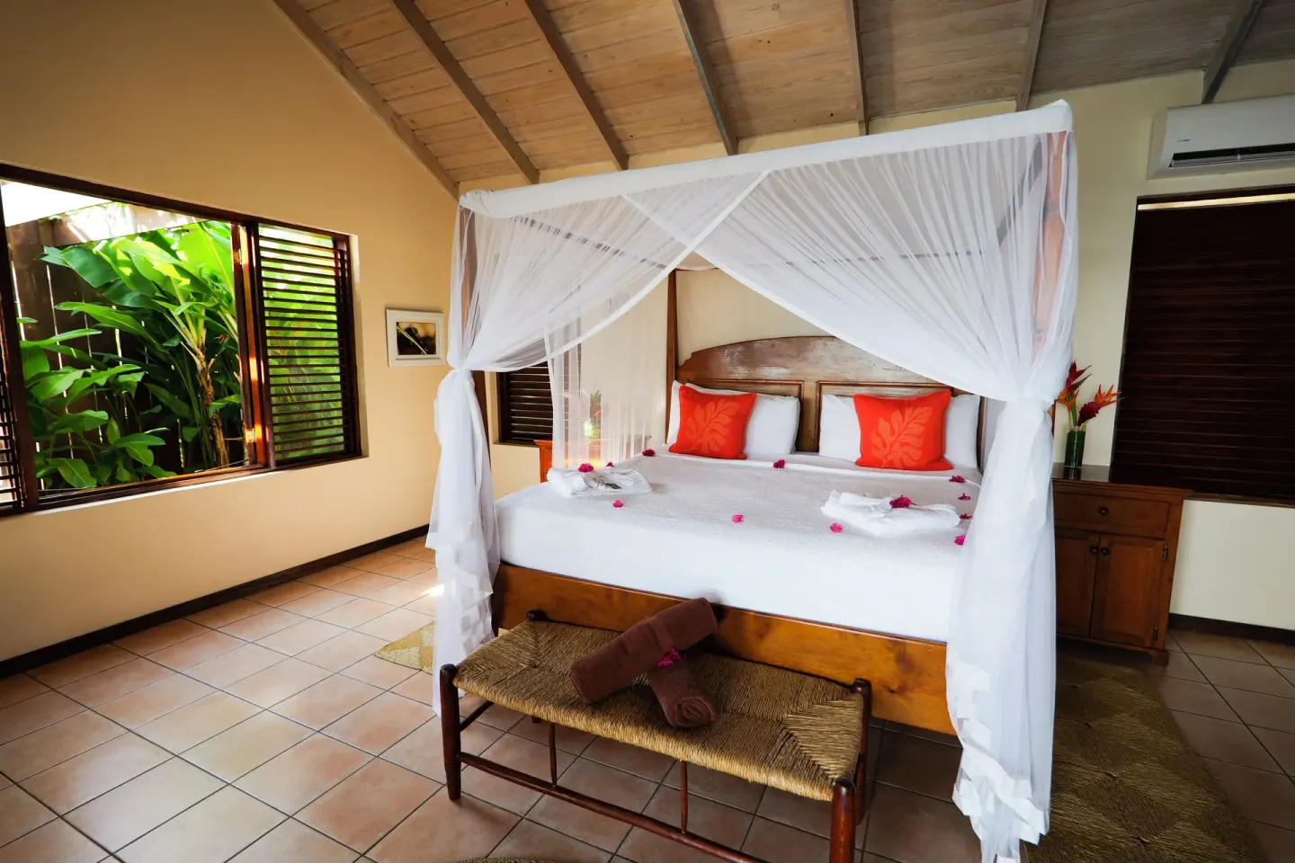 Ocean View Villa bedroom with netted king bed at Stonefield Villa Resort.
