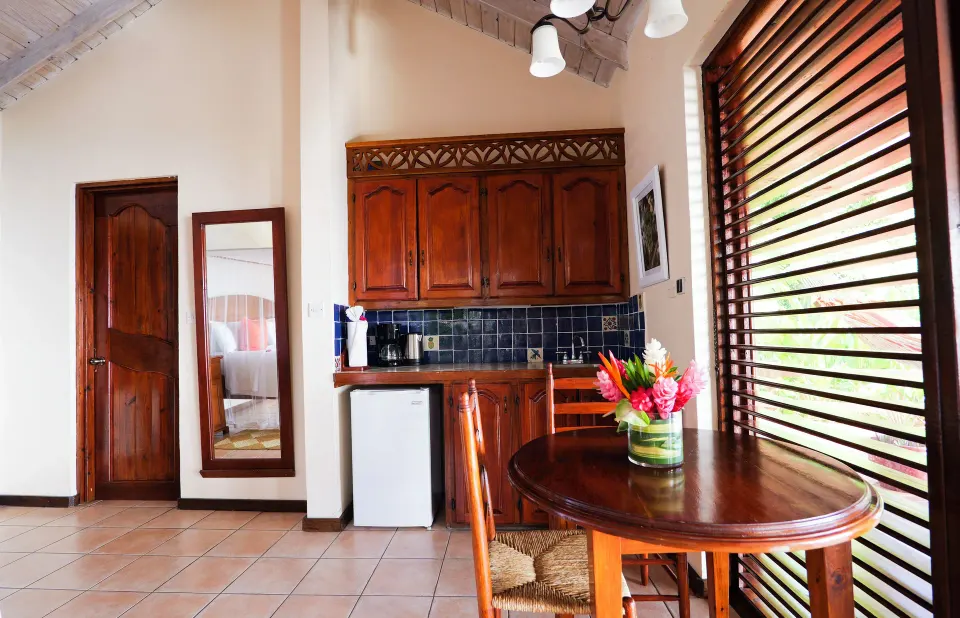 Ocean View Villa kitchenette by louvered windows at Stonefield Villa Resort.
