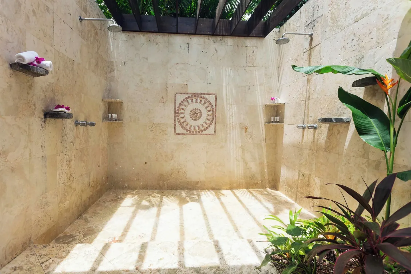 Open-air double shower in a Piton Ocean View Villa at Stonefield Villa Resort.