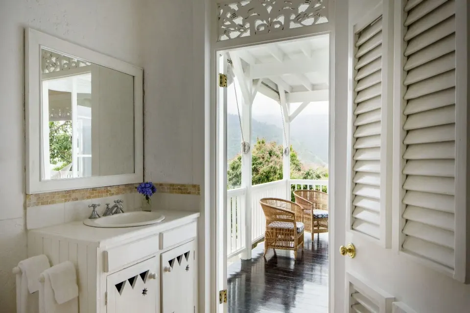 Villa 2 Bedrooms bathroom vanity and veranda seating at Strawberry Hill.
