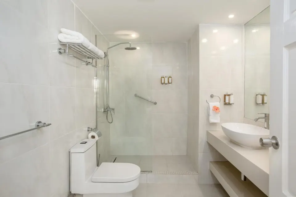 Signature room bathroom with walk-in shower at Sugar Bay Barbados.