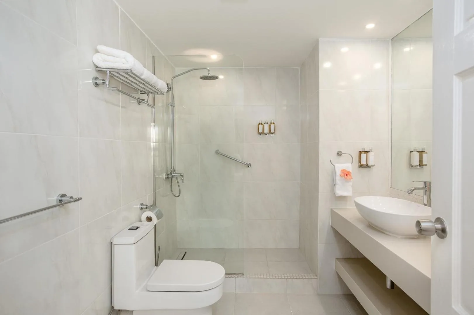 Oceanfront Honeymoon Suite bathroom with walk-in shower at Sugar Bay Barbados featuring modern fixtures and tropical design.