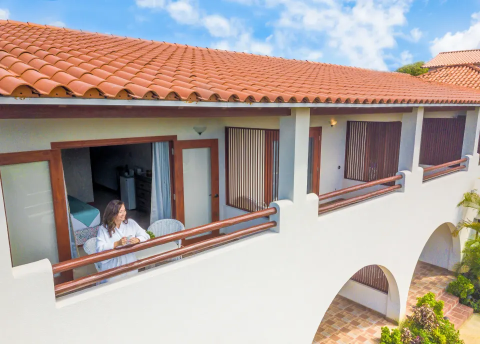 Exterior balcony of a Garden View room at Sugar Cane Club Hotel And Spa.