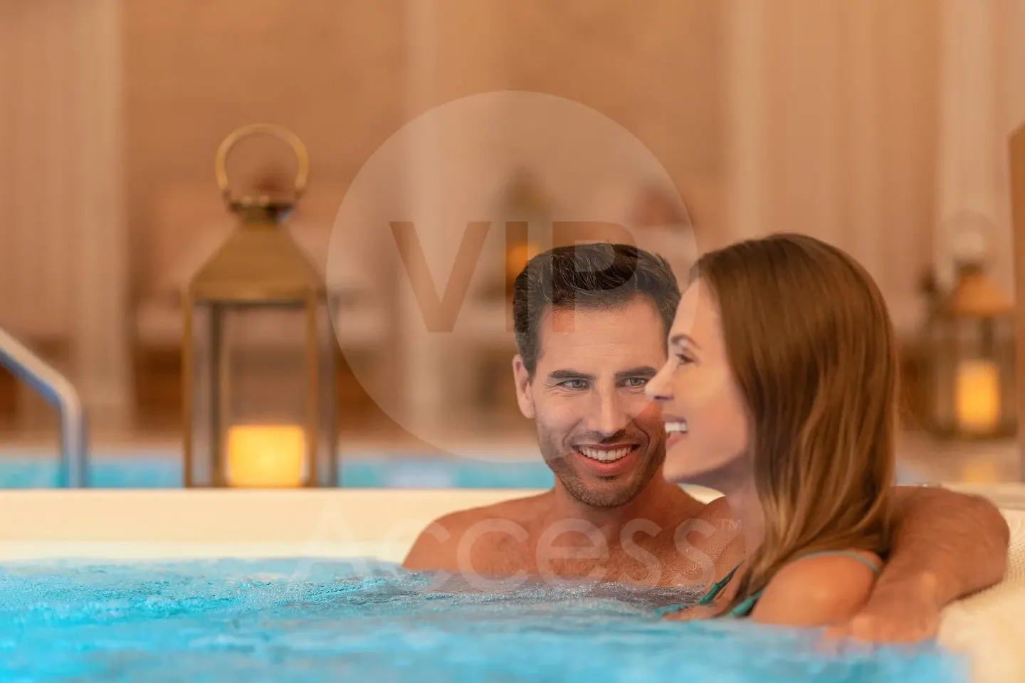 Couple relaxing in a bubbling spa pool at Sun Palace Cancun.