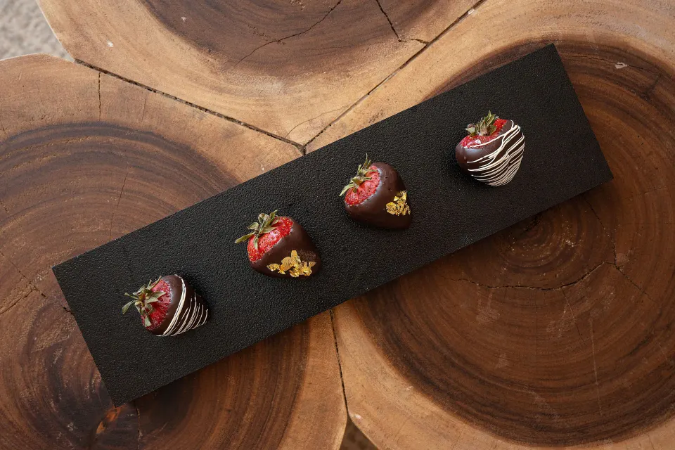 Chocolate-covered strawberries in a Superior Deluxe Ocean View room at Sun Palace Cancun.