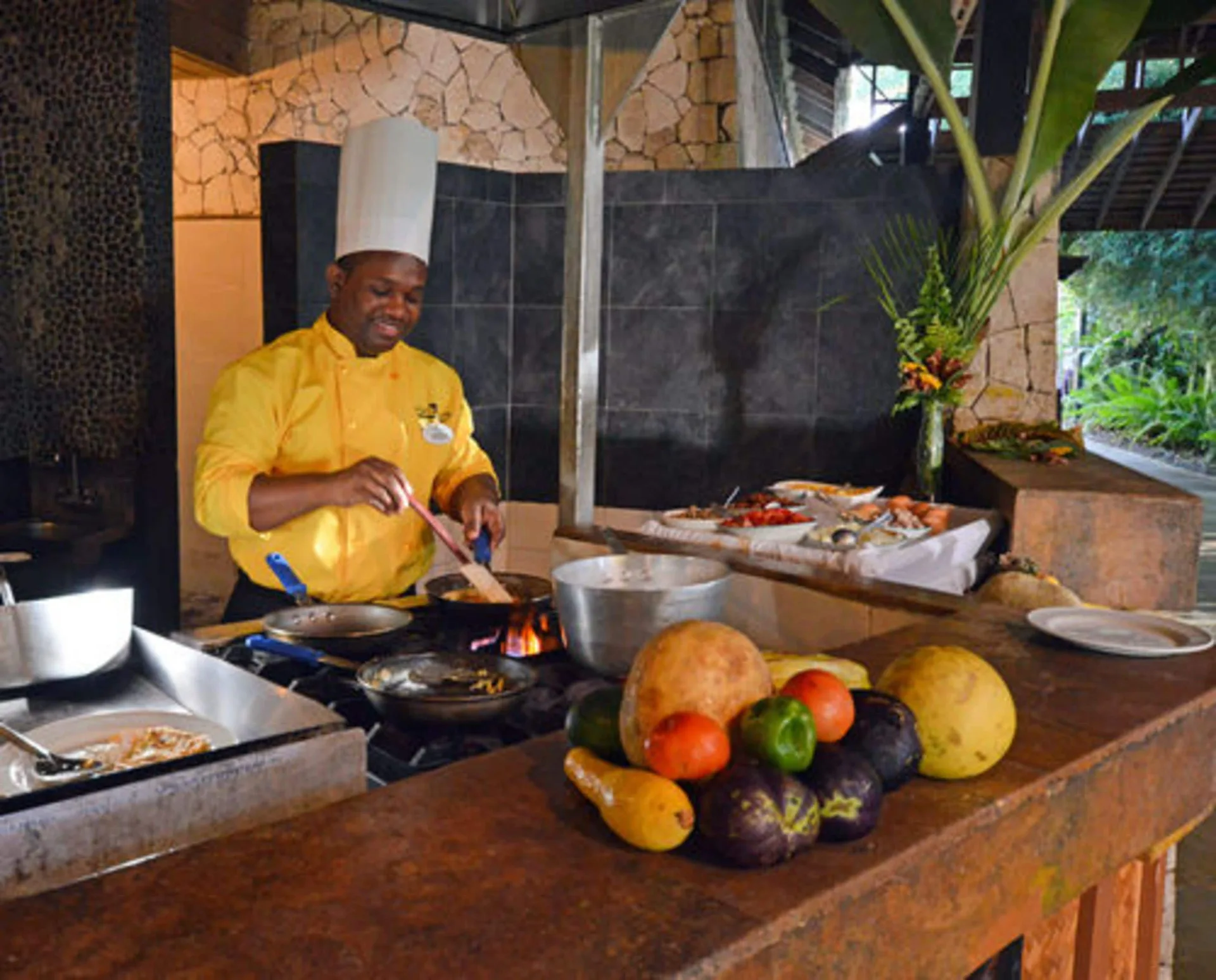 Chef cooking at an open station at Sunset at the Palms Resort.