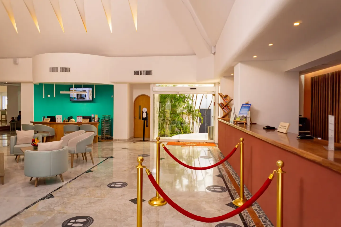 Lobby reception desk and seating area at Sunset Marina Resort & Yacht Club.