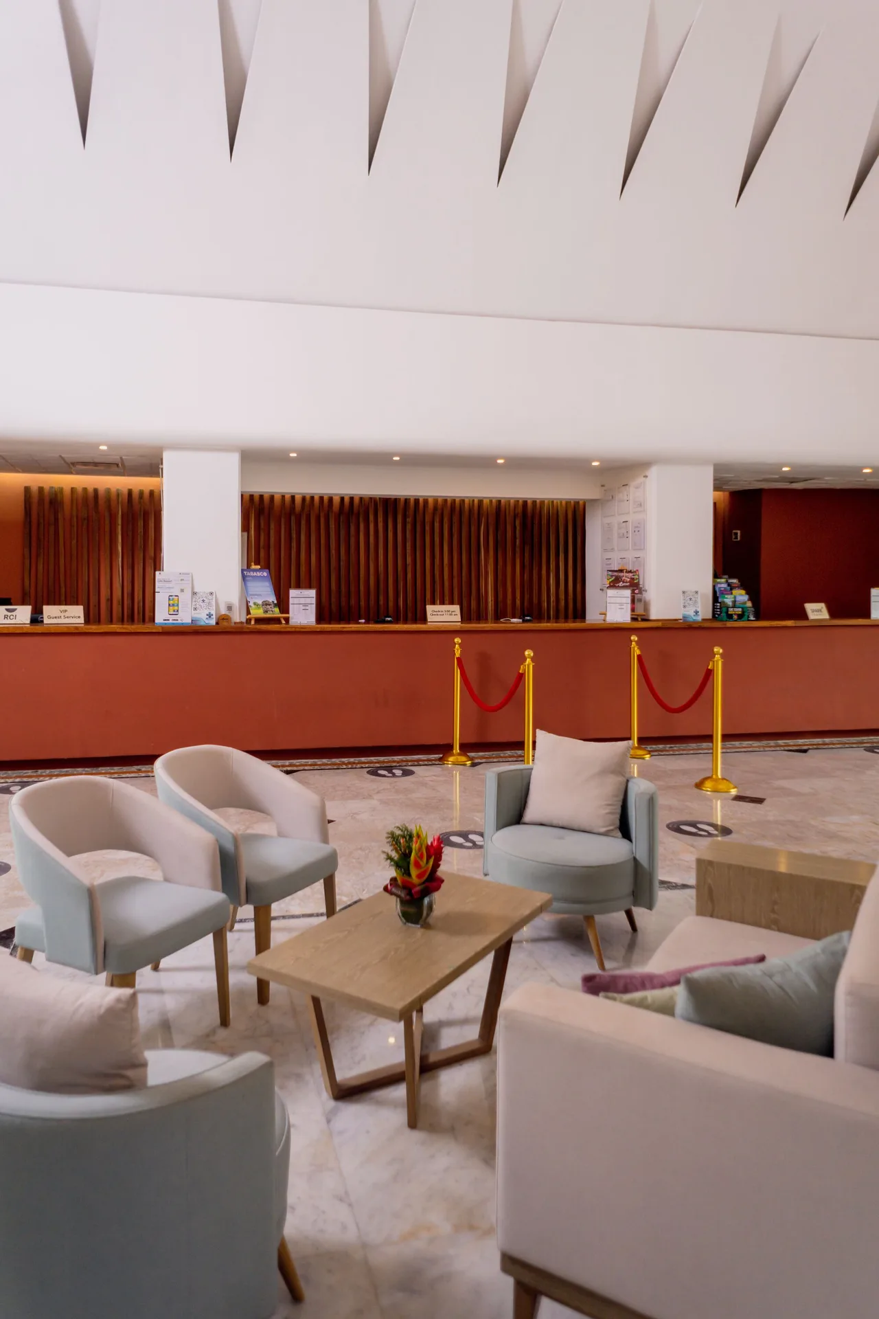 Lobby seating and reception desk at Sunset Marina Resort & Yacht Club.