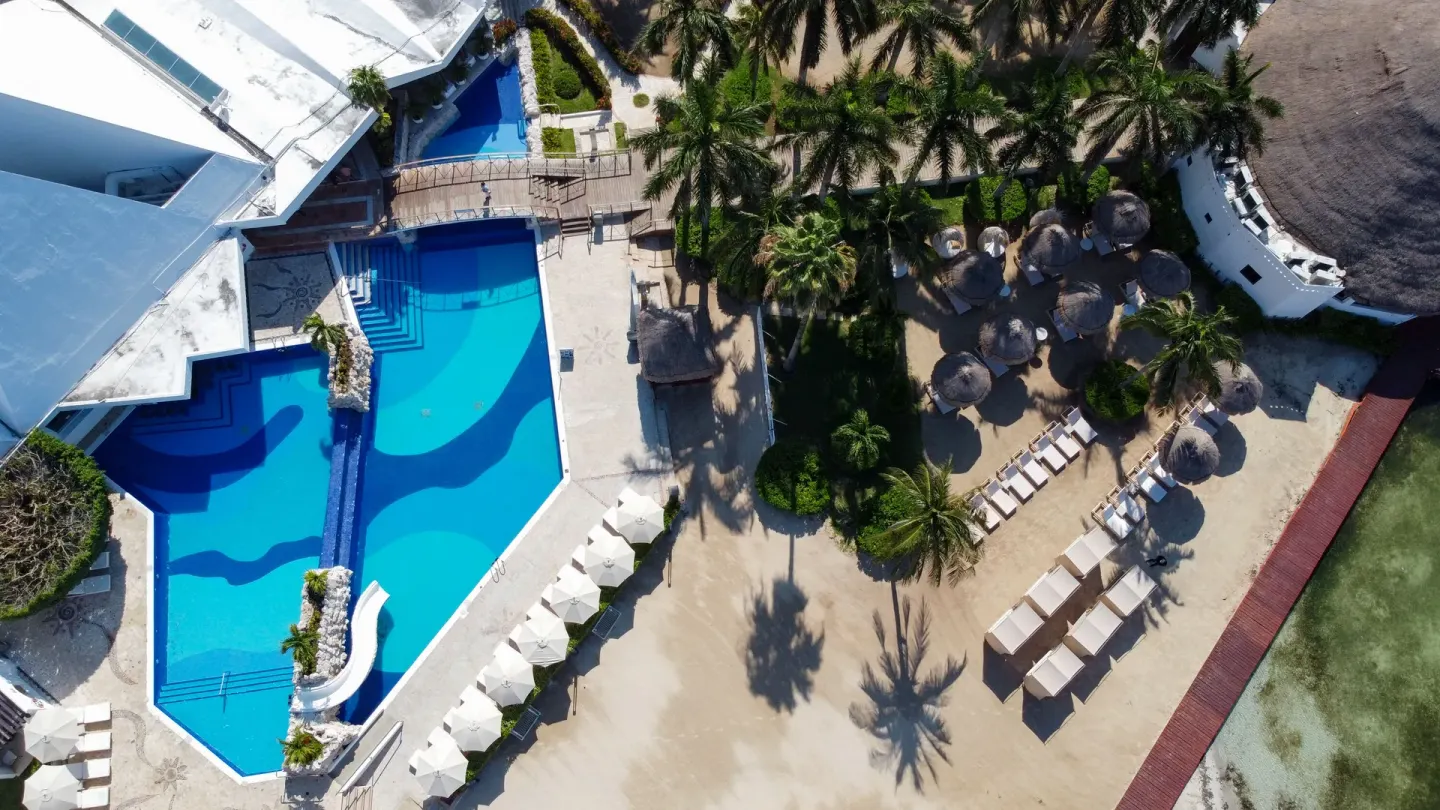 Overhead pool, palapas and loungers at Sunset Marina Resort & Yacht Club.