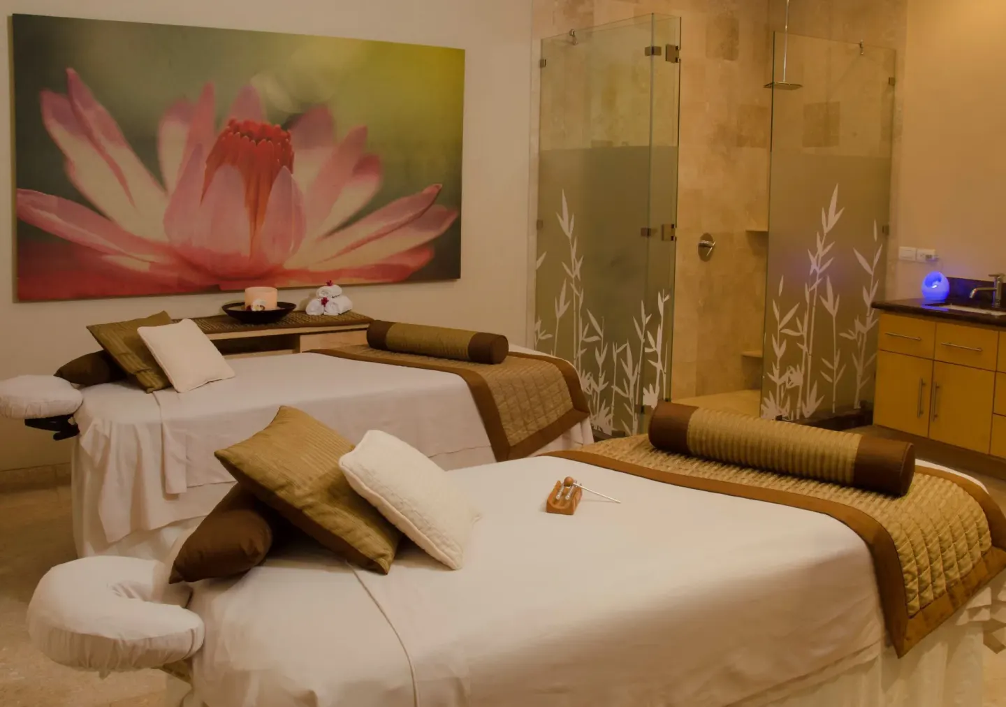 Spa treatment room with two massage tables at Sunset Plaza Beach Resort & Spa Pto Vallarta.