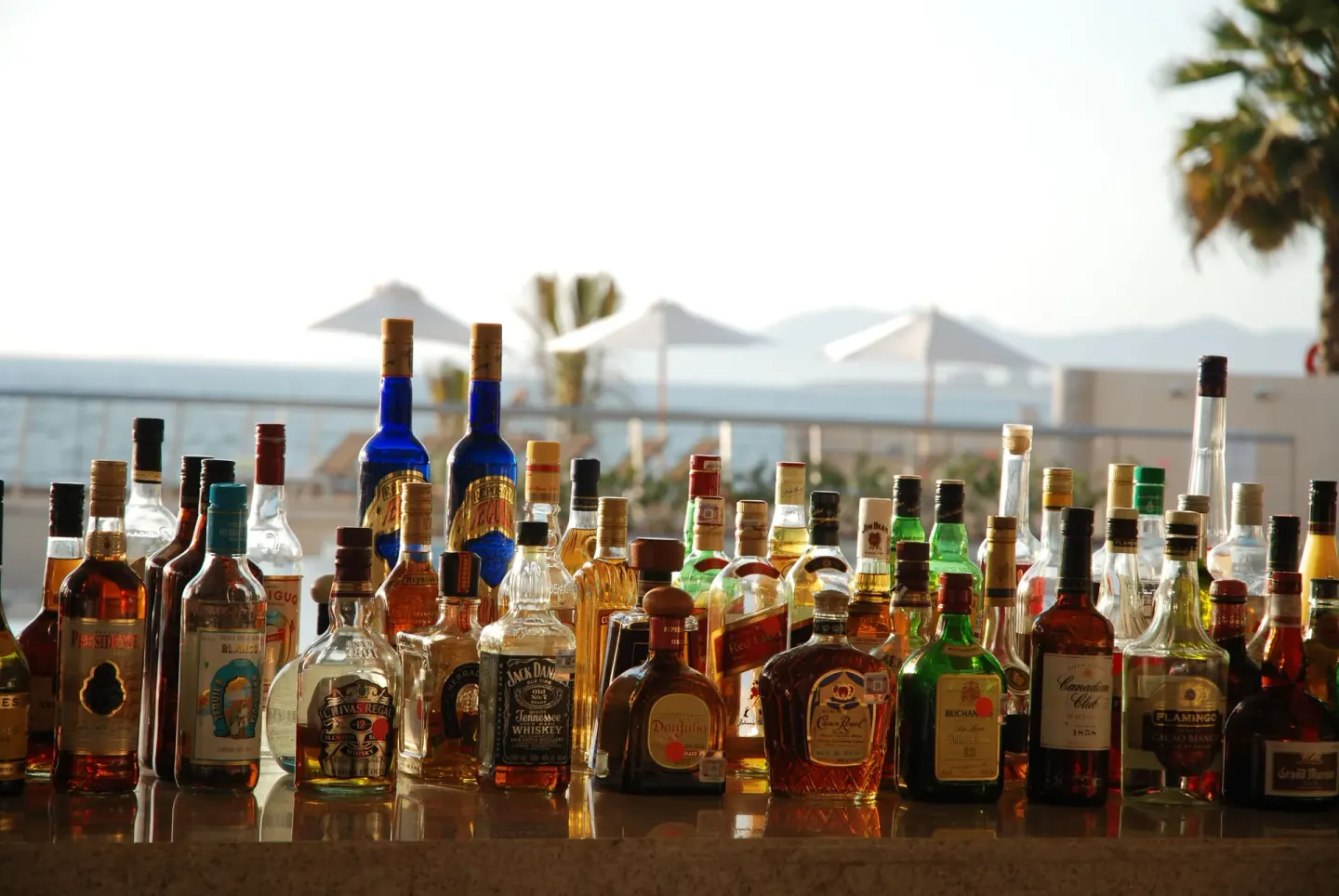 Bar bottles overlooking the ocean at Sunset Plaza Beach Resort & Spa Pto Vallarta.