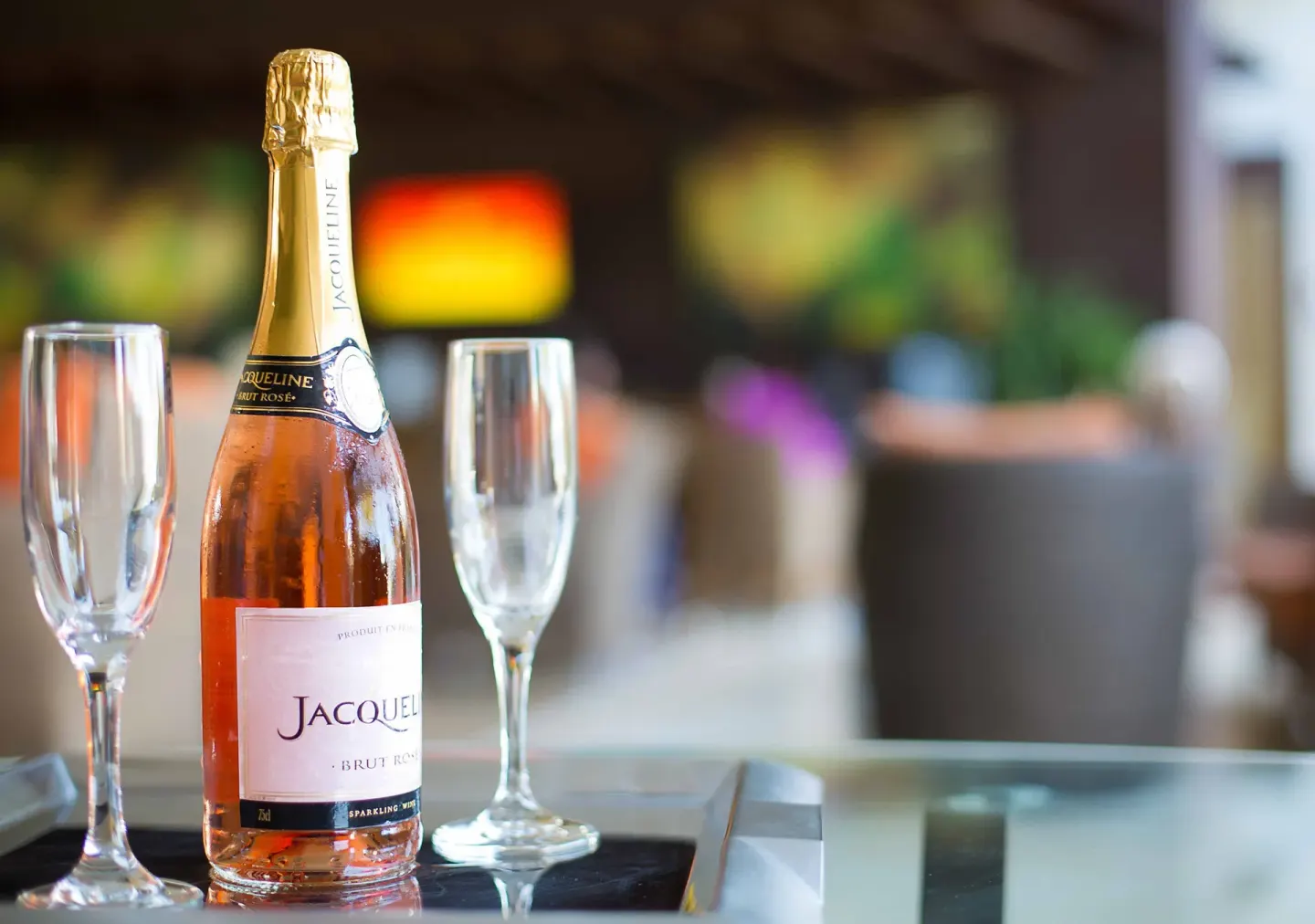 Sparkling wine bottle and two flutes at Sunset Plaza Beach Resort & Spa Pto Vallarta.