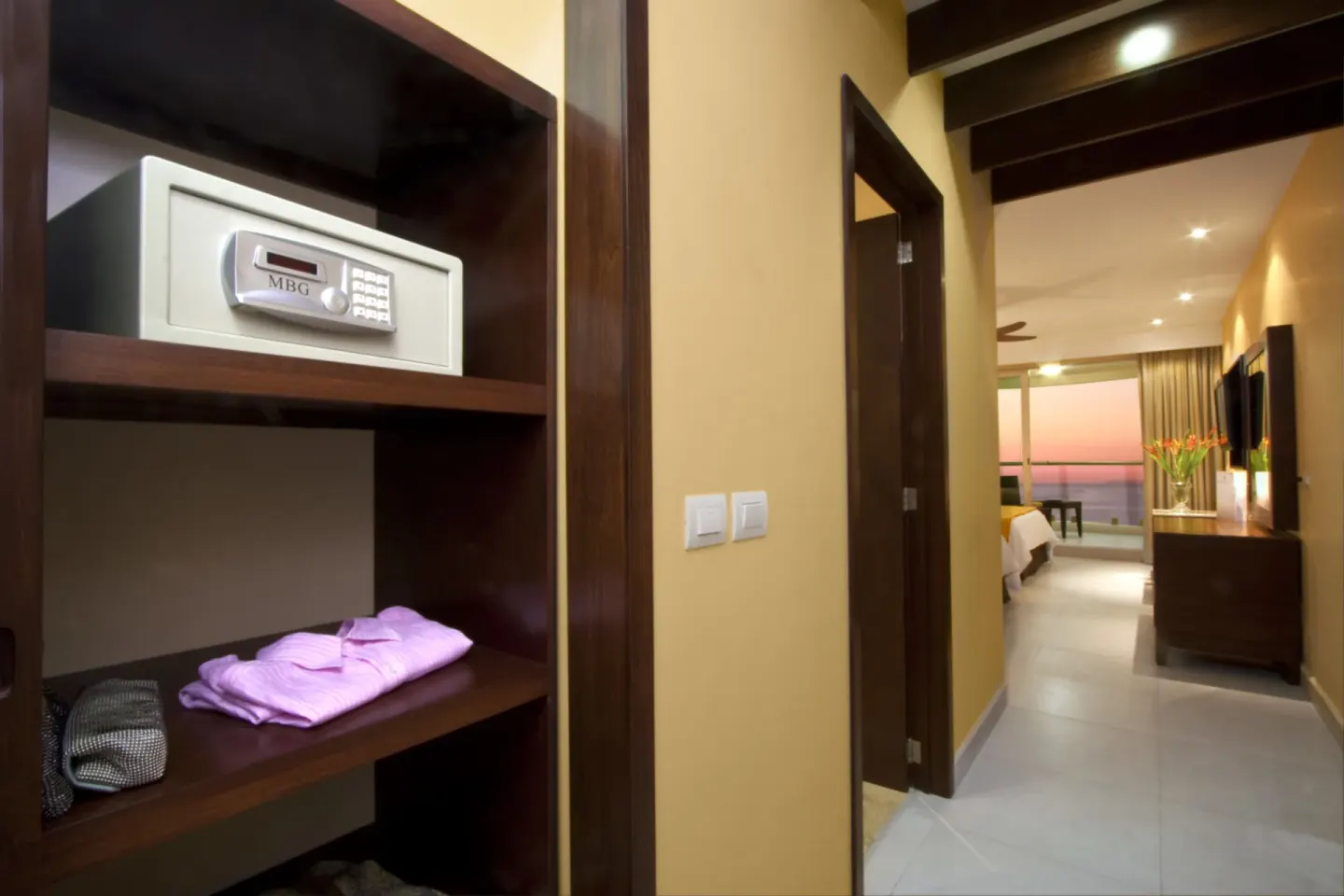 Deluxe Ocean Front closet safe and room entry at Sunset Plaza Beach Resort & Spa Pto Vallarta.