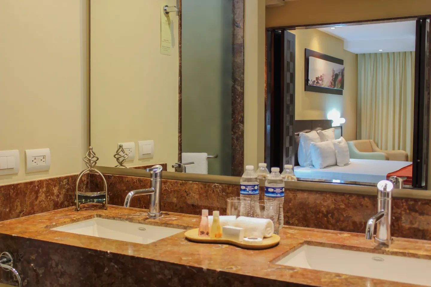 Oceanfront Suite bathroom vanity at Sunset Plaza Beach Resort & Spa Pto Vallarta.