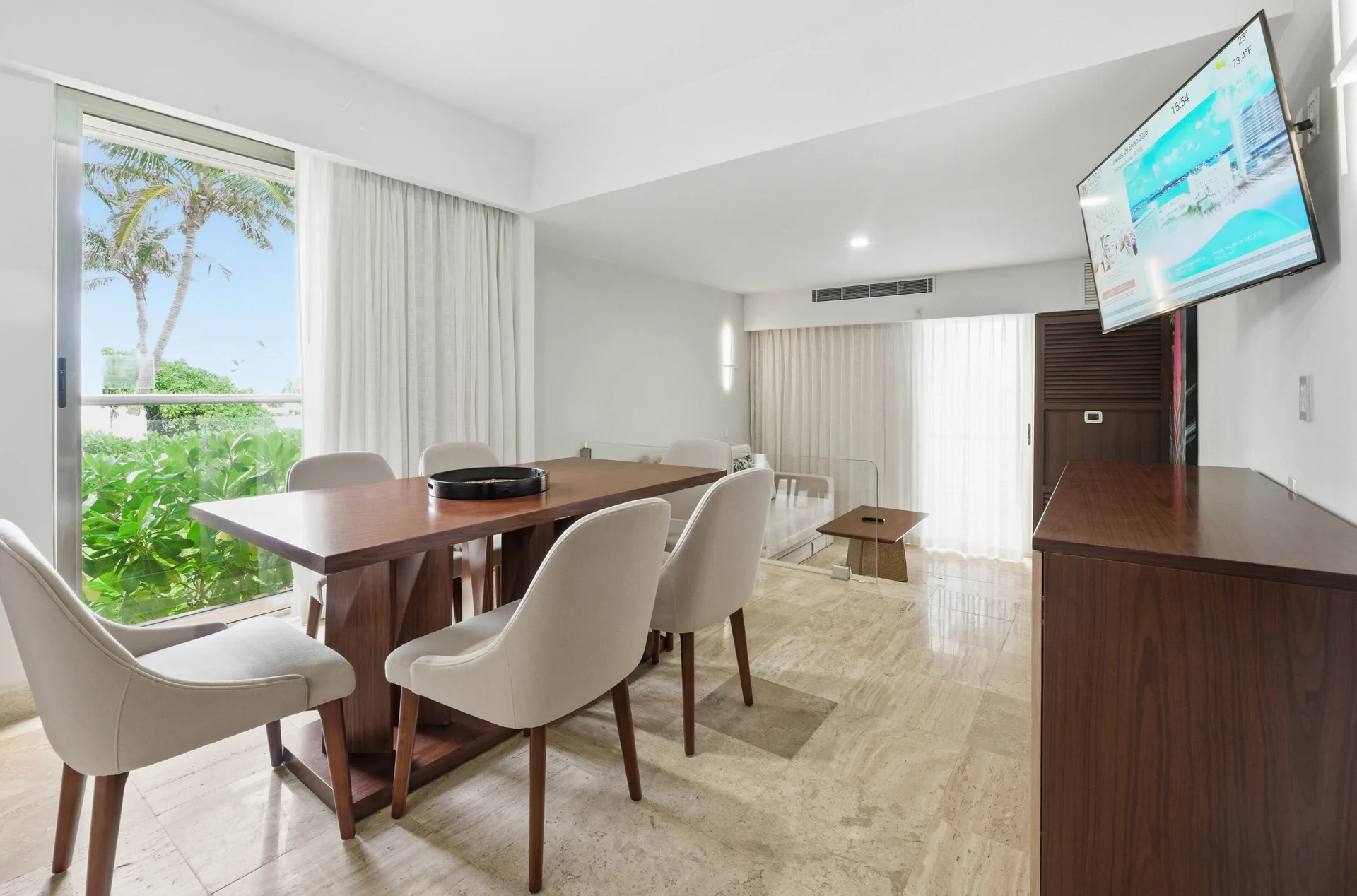 Family Studio Suite Ocean View dining area and lounge at Sunset Royal Beach Resort.