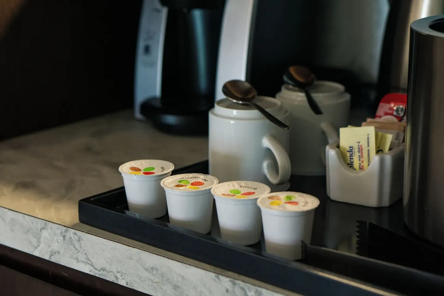 Standard Room coffee and tea setup on a tray at Sunset Royal Beach Resort.