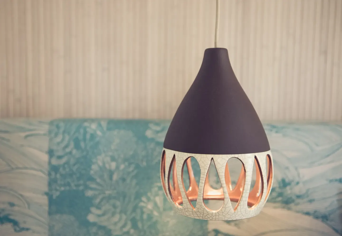 Hanging pendant light with patterned shade at Surfjack Hotel & Swim Club.