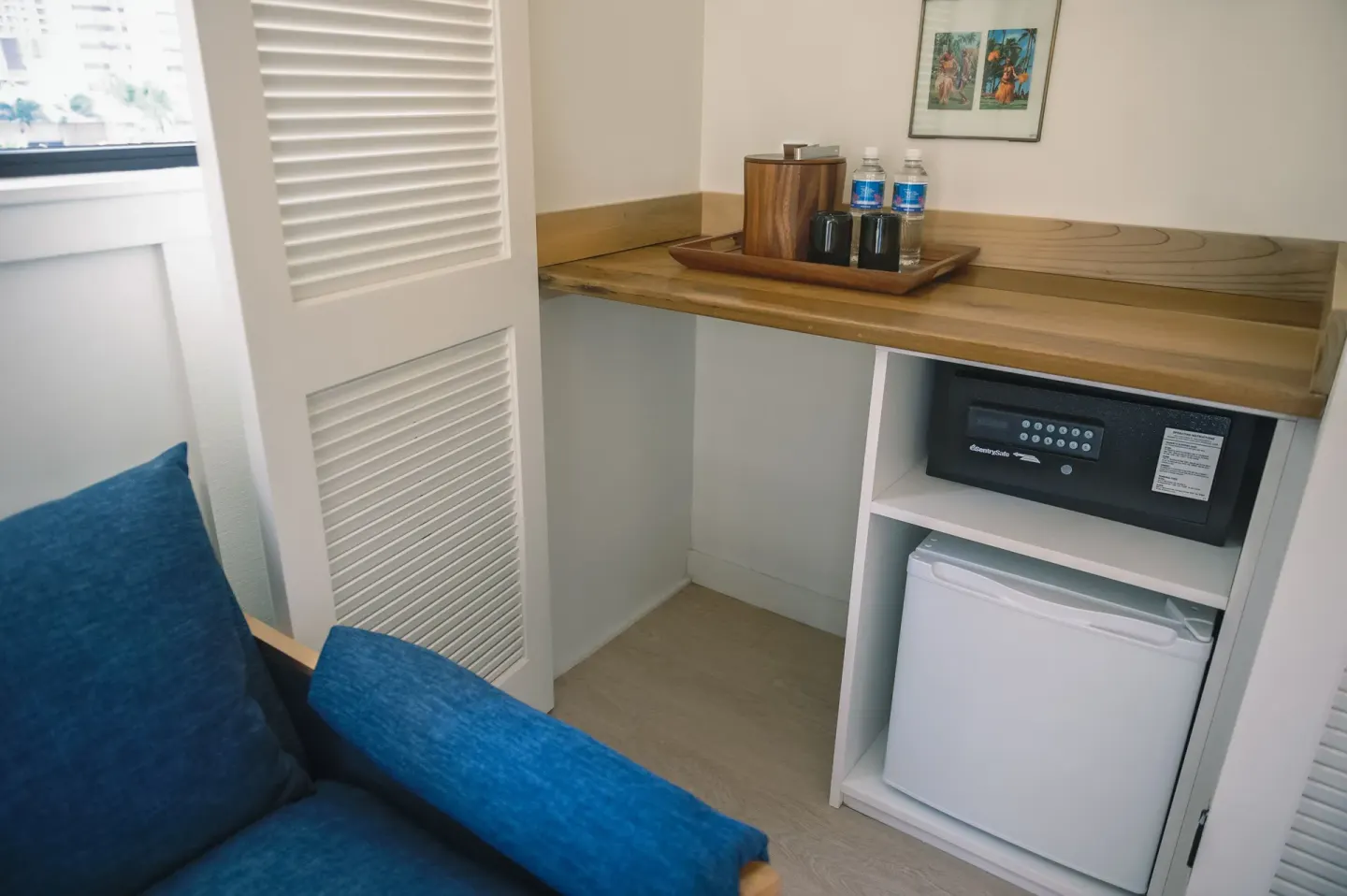 One Bedroom Suite refreshment nook with mini fridge and safe at Surfjack Hotel & Swim Club.