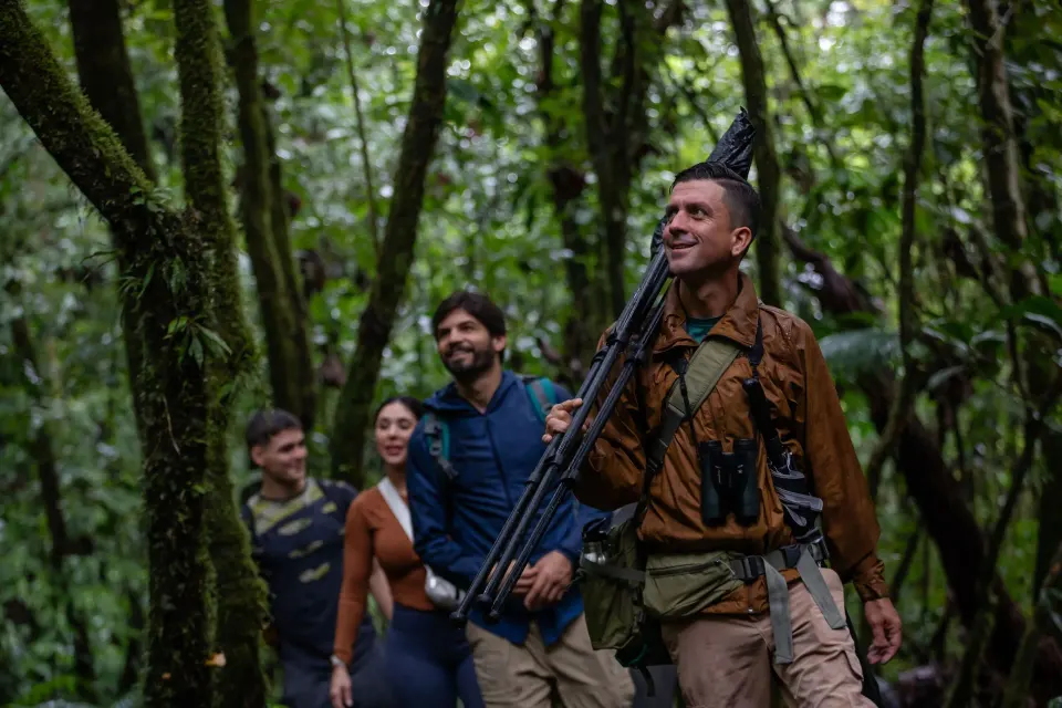 Guided hiking group walking through dense rainforest at Tabacón Thermal Resort & Spa