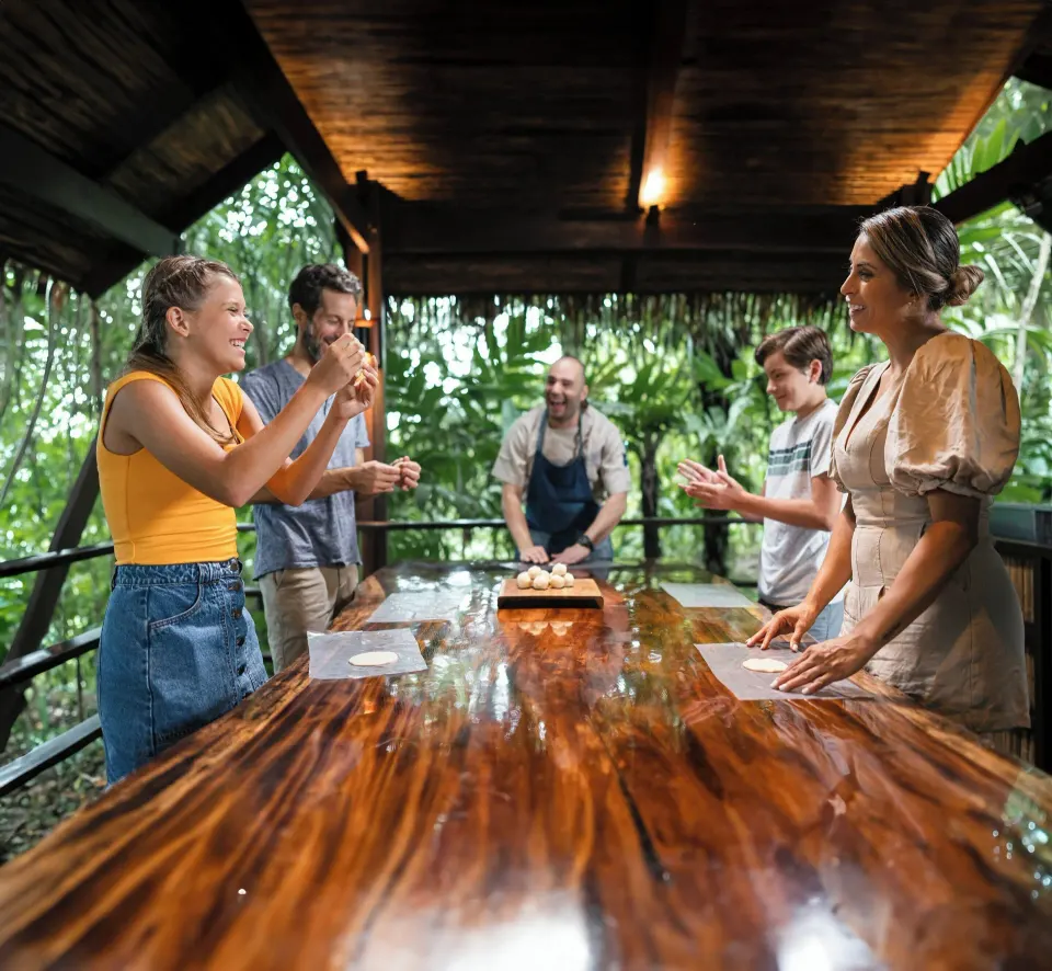 Guests enjoying a hands-on cooking class at Tabacón Thermal Resort & Spa