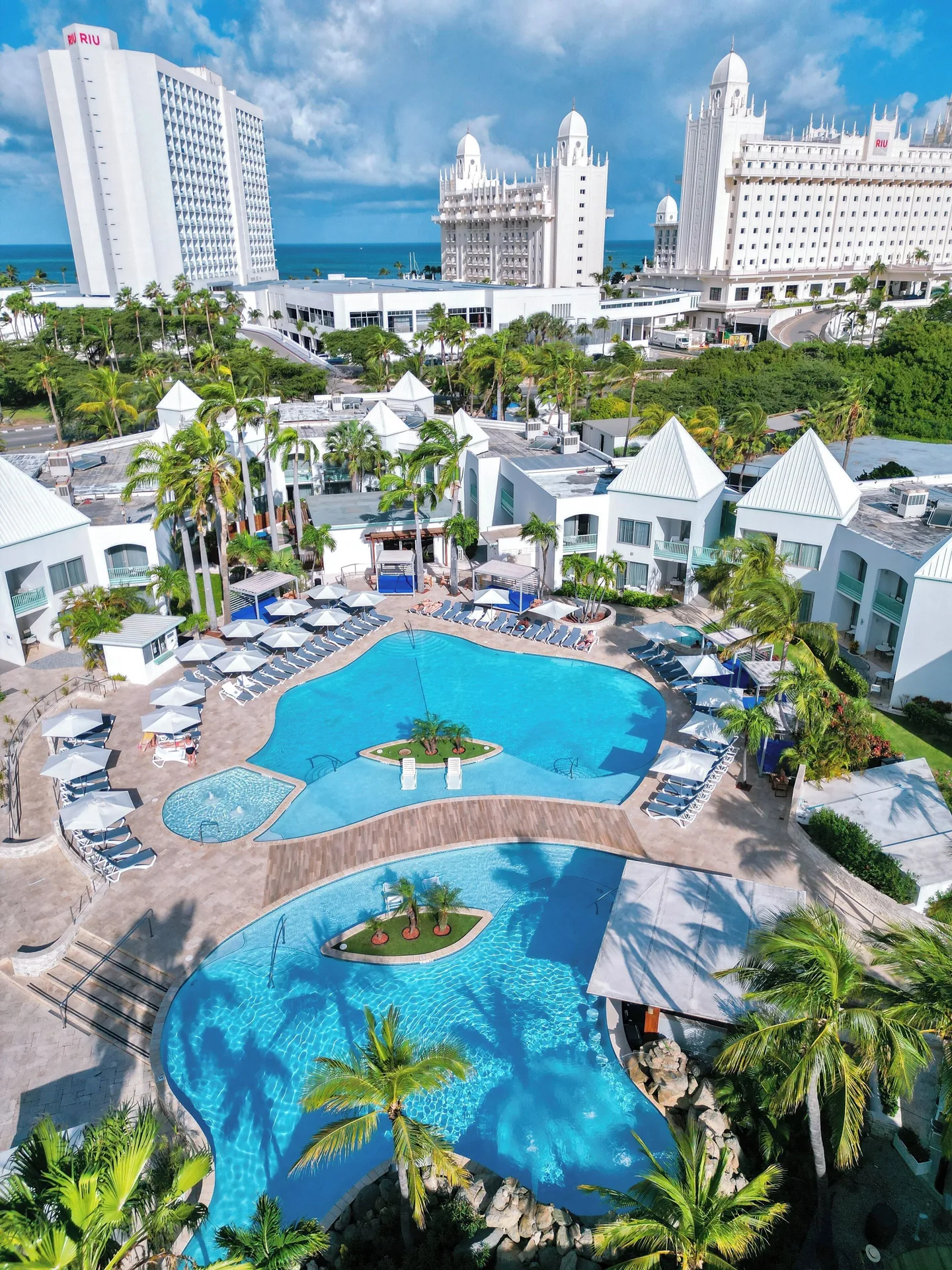 The Mill Resort and Suites relaxed Aruba resort with tropical pool and Palm Beach access