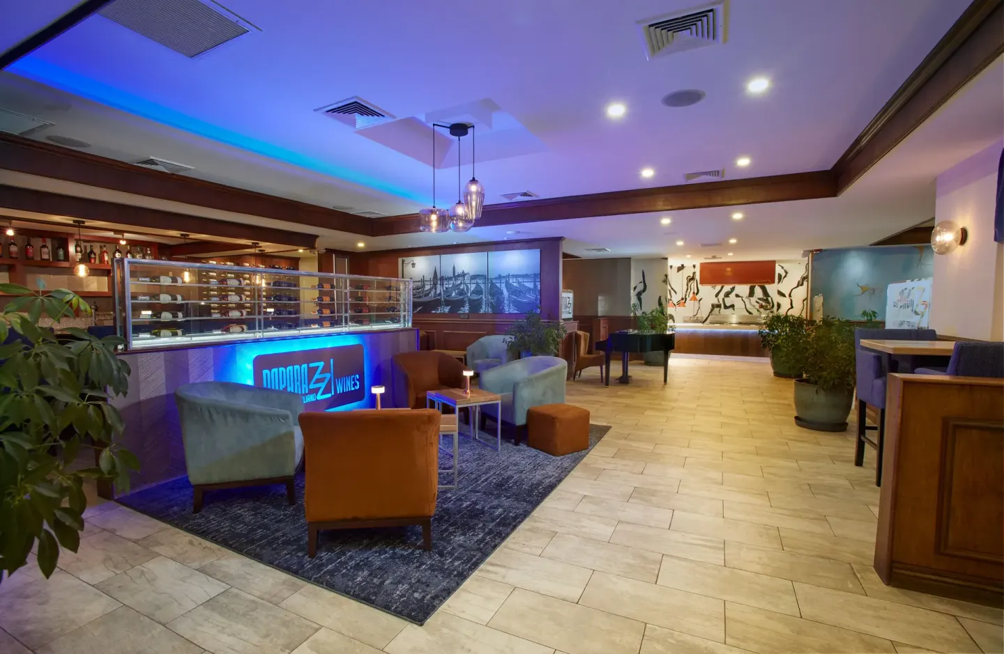 Paparazzi lounge seating and display counter inside Tamarijn Aruba.