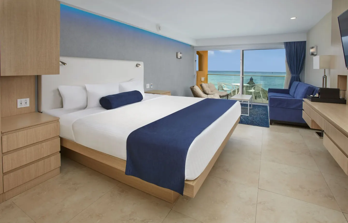 Deluxe Oceanfront room with king bed and sea view at Tamarijn Aruba.