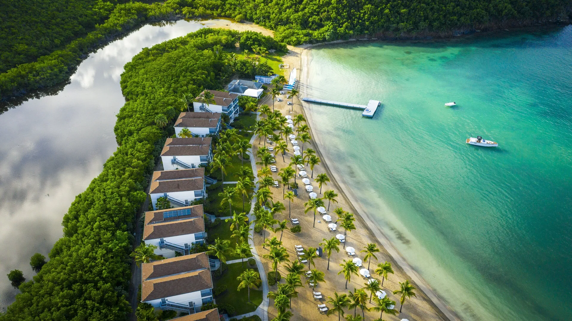 Carlisle Bay luxury beach resort with family-friendly suites and calm Caribbean water views