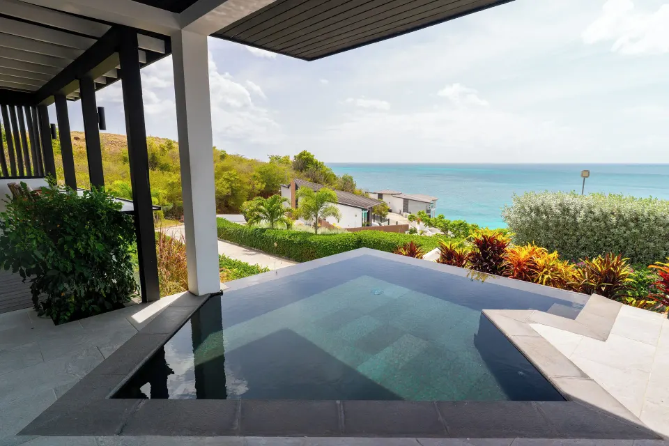 Seastar terrace plunge pool with ocean view at Tamarind Hills Resort & Villas.