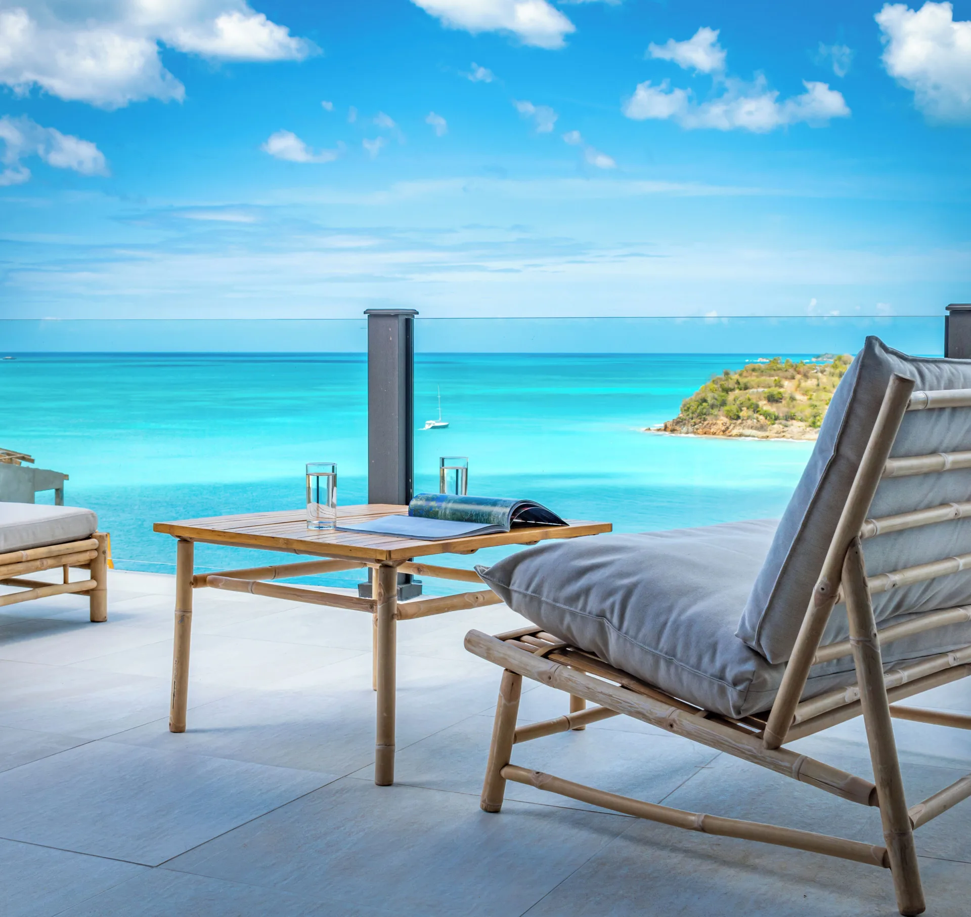 Ocean view terrace seating for a studio at Tamarind Hills Resort & Villas.