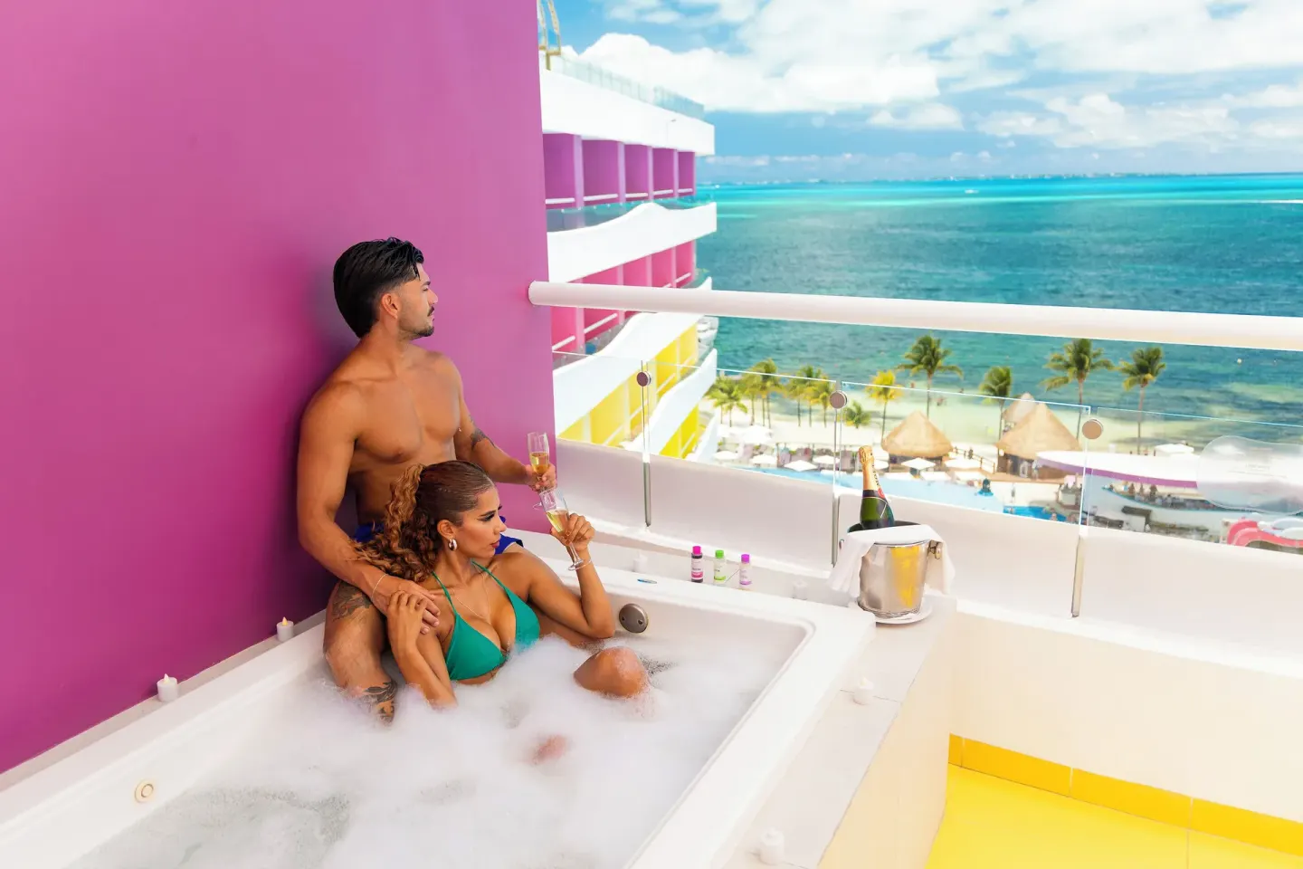 Lush Tower Ocean Front balcony tub with ocean view at Temptation at The Tower Cancún.