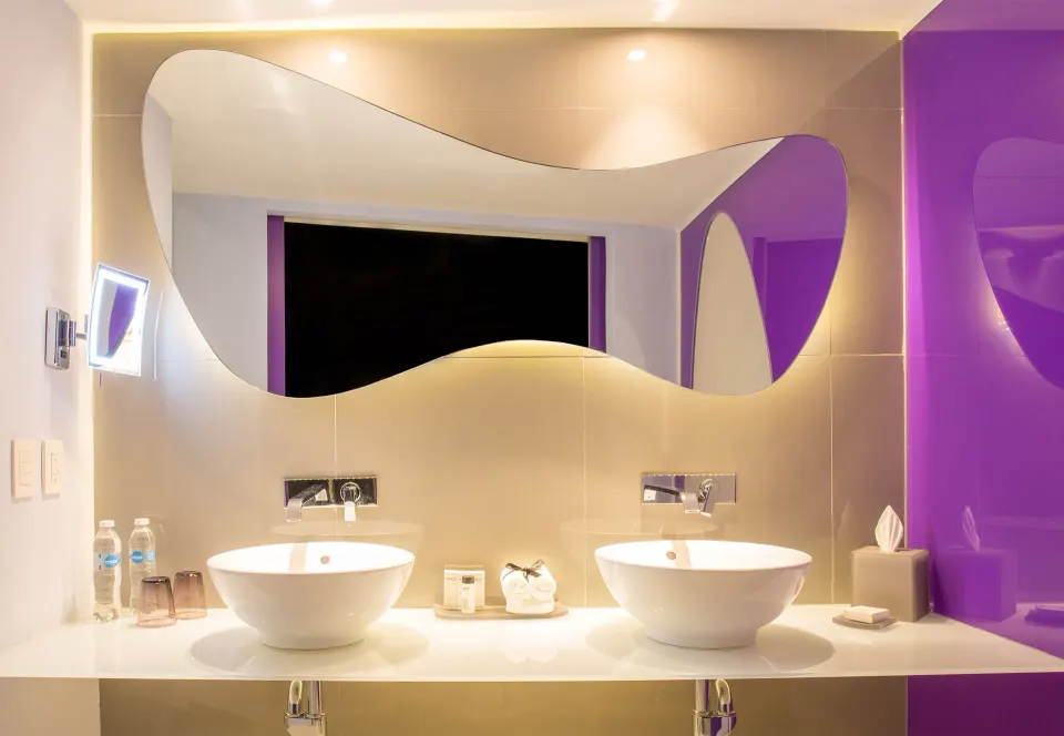 Lush Tower Ocean Front double vanity bathroom at Temptation Cancún.