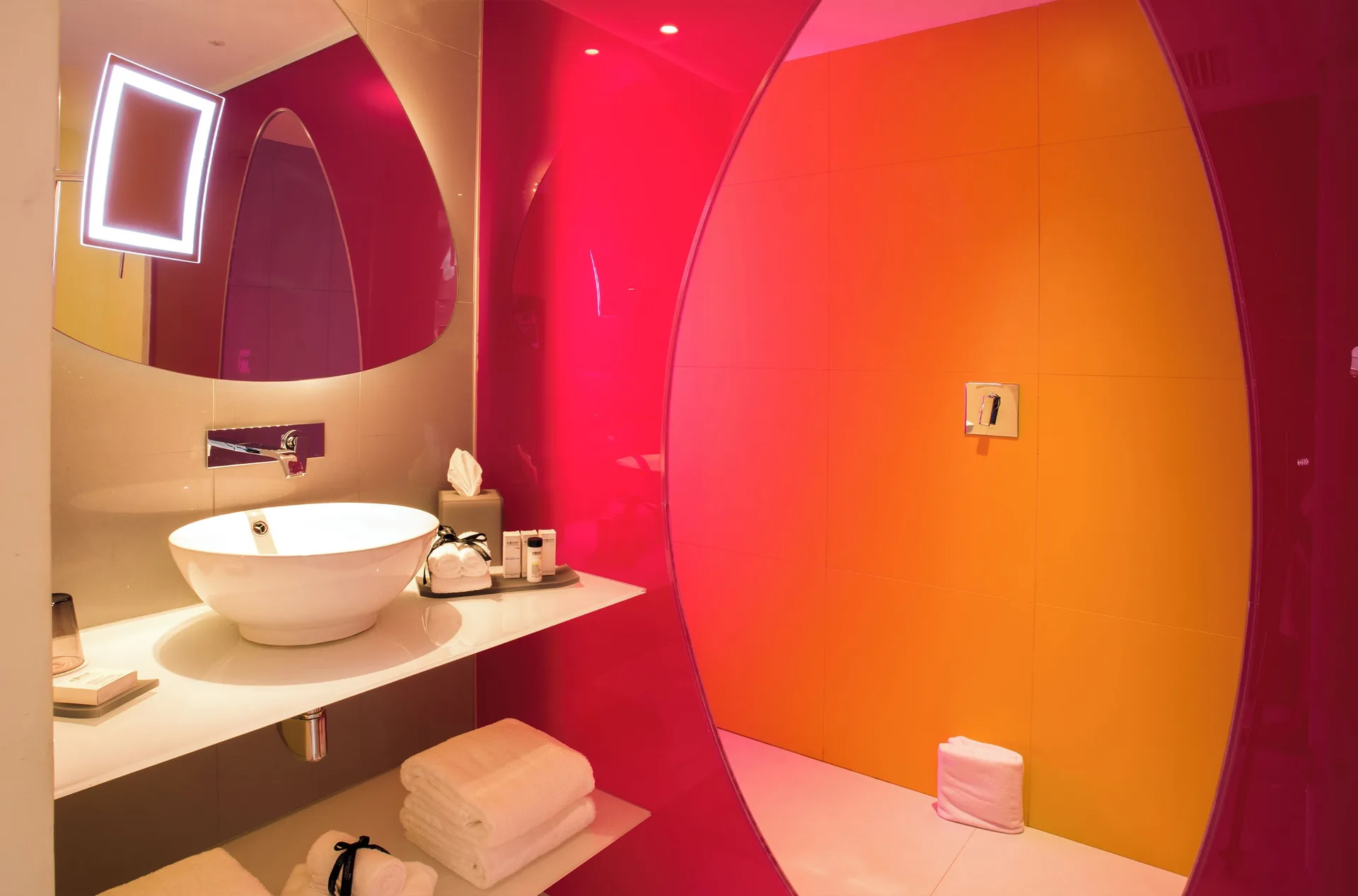 Plush Jacuzzi Ocean View/Garden View room bathroom vanity and shower at Temptation at The Tower Cancún.