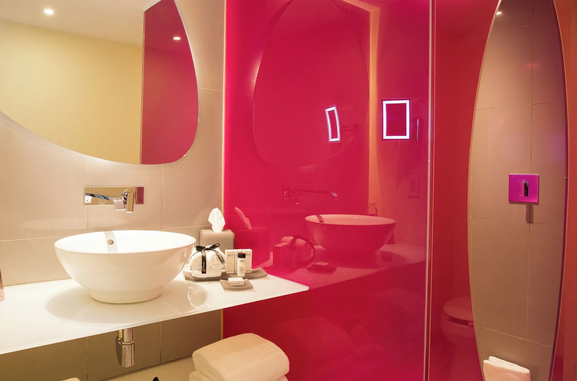 Bathroom vanity and shower area in a Trendy room at Temptation at The Tower Cancún.