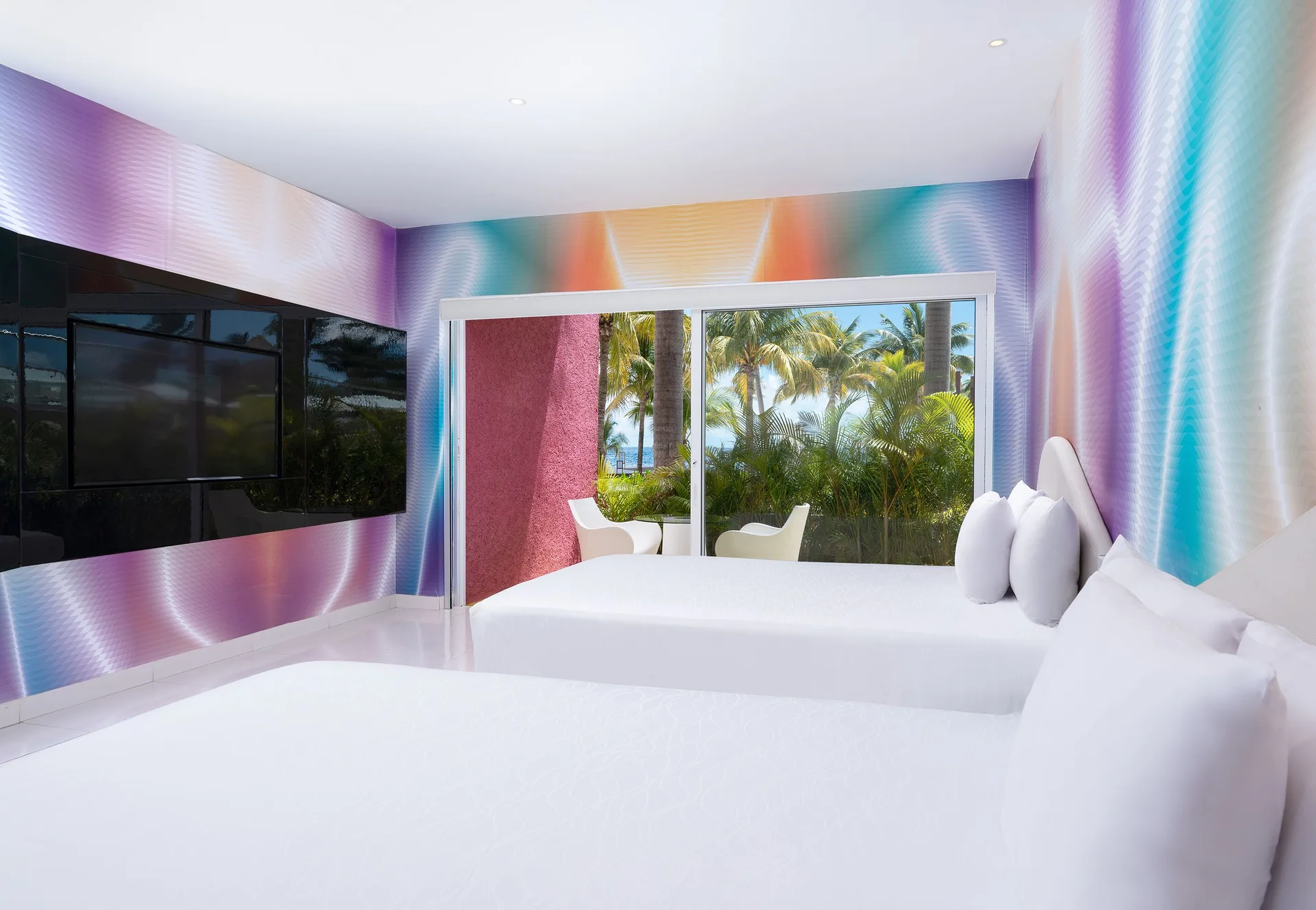 Trendy Ocean View Room with two beds and patio view at Temptation at The Tower Cancún.