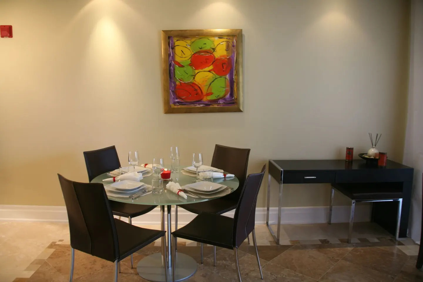 One Bedroom Condo dining area and desk at The Atrium Resort.