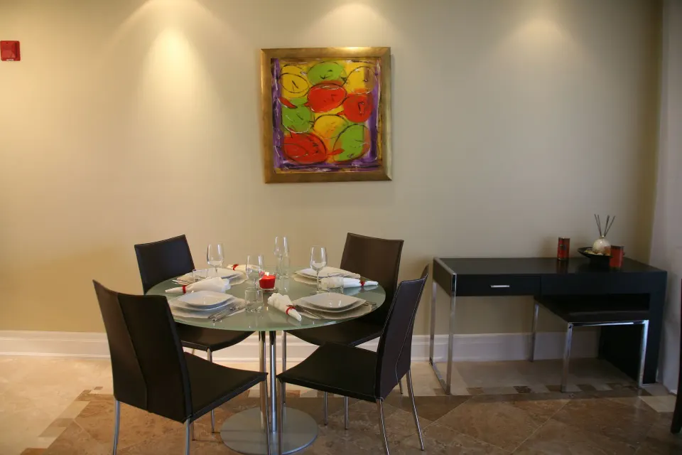 One Bedroom Condo dining area and desk at The Atrium Resort.