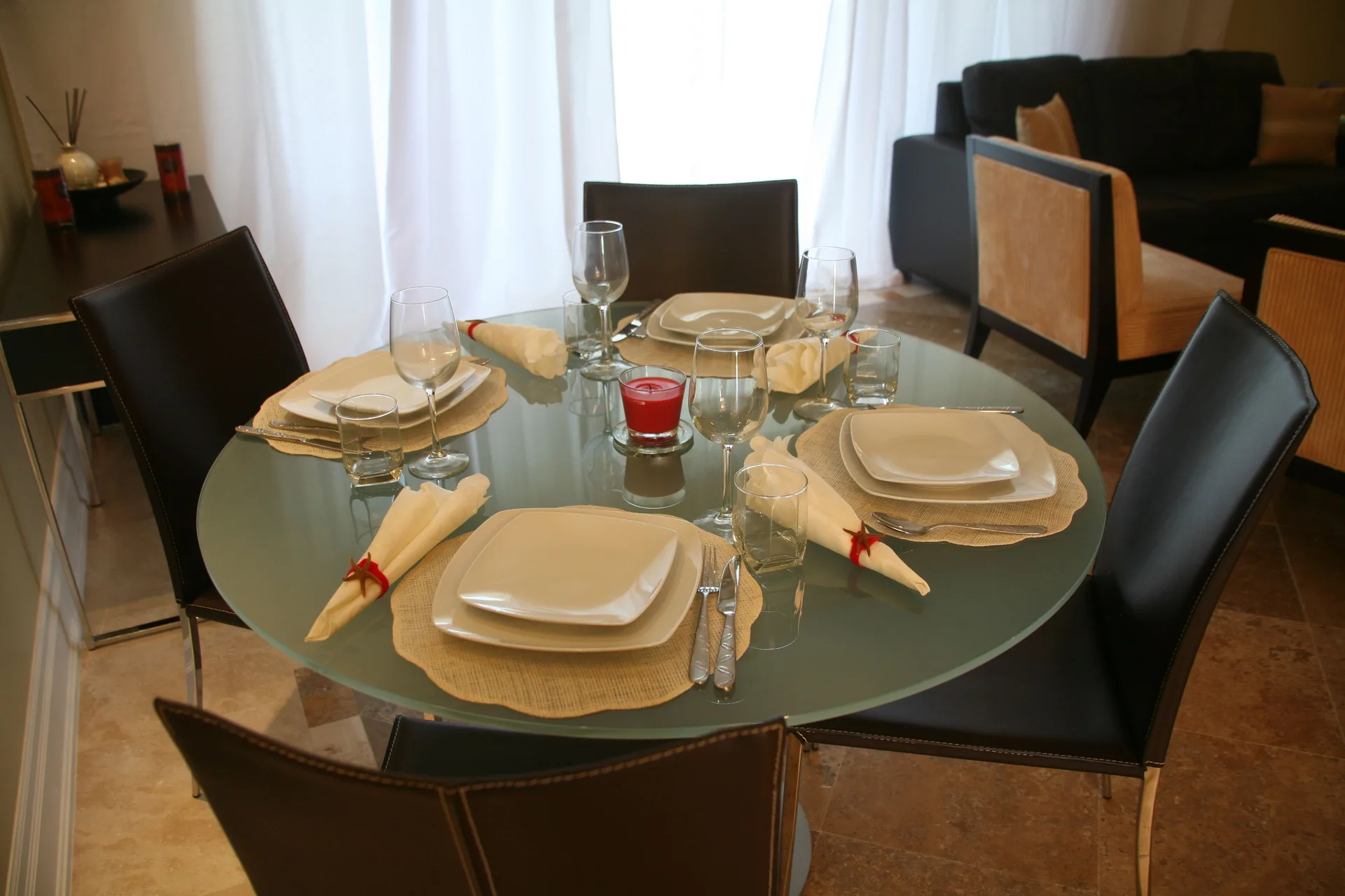 One Bedroom Condo dining table set for four at The Atrium Resort.