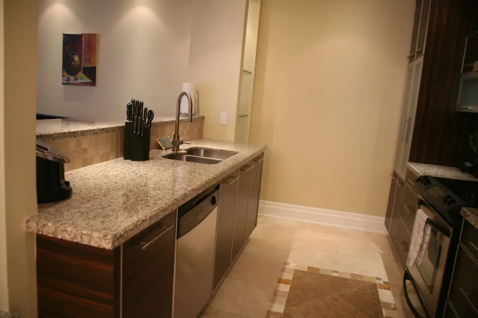 One Bedroom Condo kitchen counter and sink at The Atrium Resort.