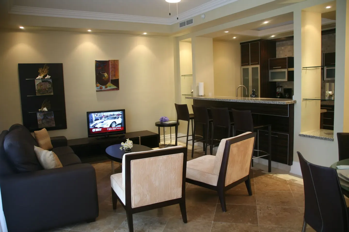 One Bedroom Condo lounge and open kitchen at The Atrium Resort.
