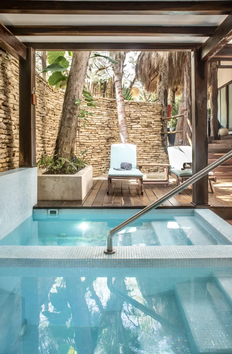 Private plunge pool and deck with loungers at The Beach Tulum