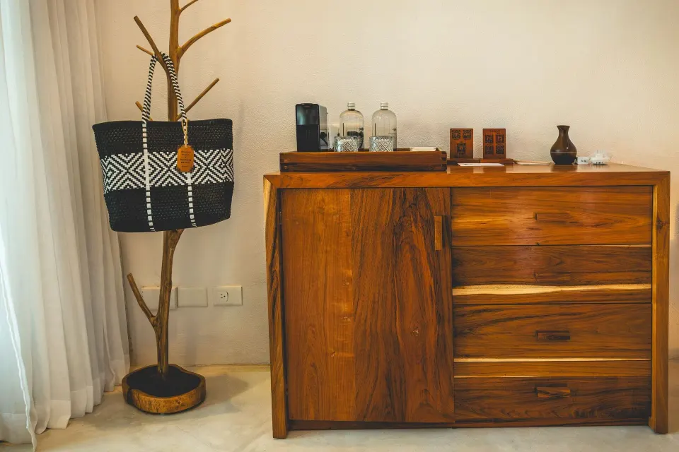 Wooden dresser with refreshments in a Deluxe Room at The Beach Tulum