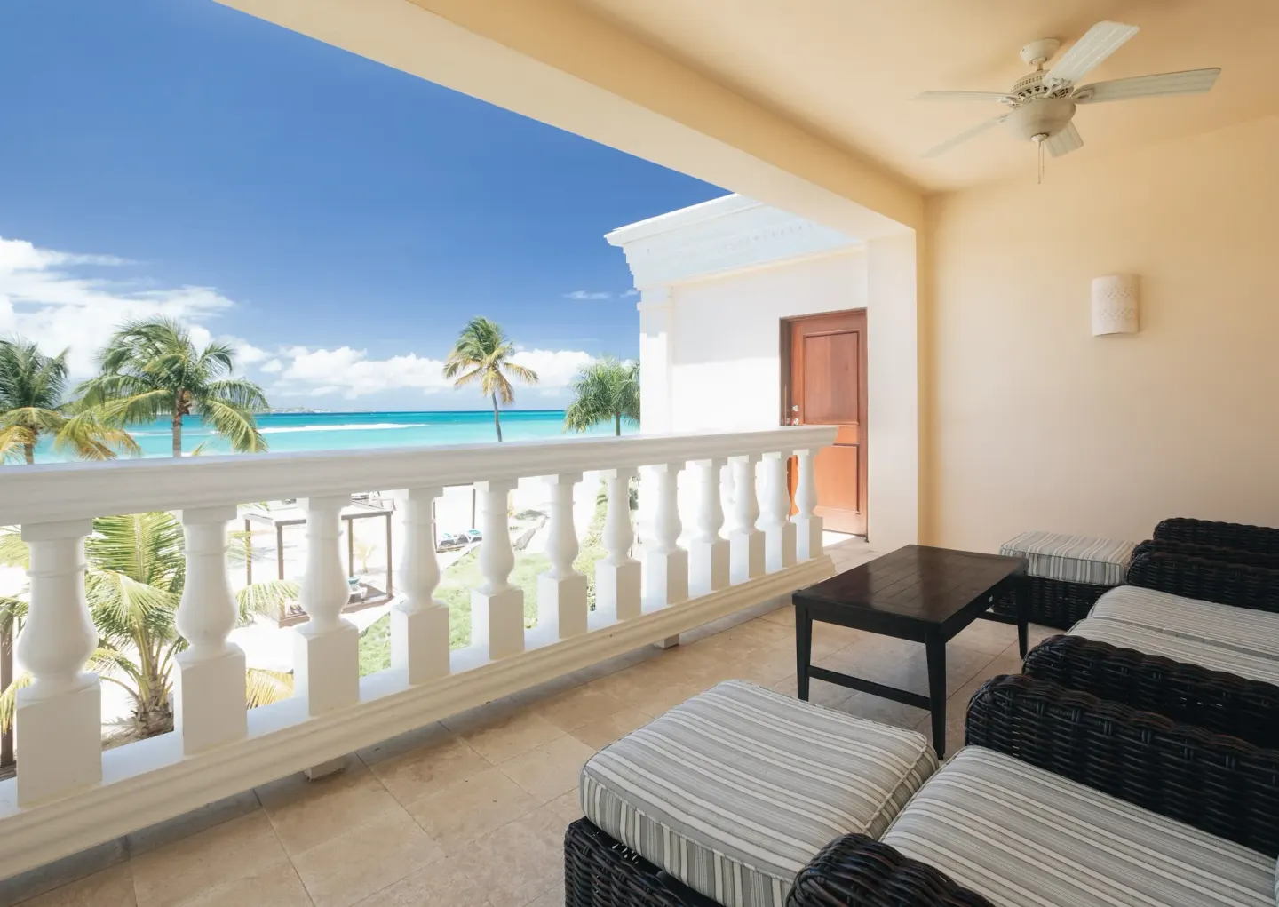 Beachside balcony with ocean view at The Buccaneer Beach & Golf Resort.