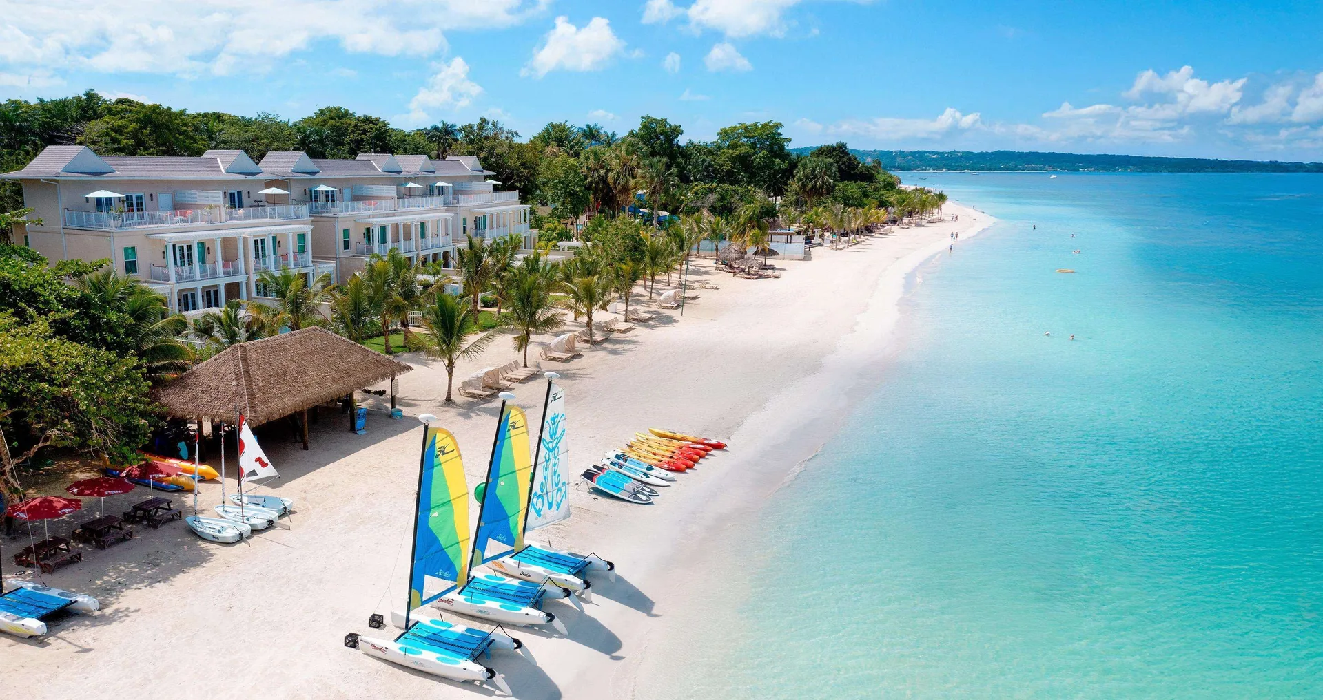 Beaches Negril Resort family all-inclusive on Seven Mile Beach in Jamaica with pools, water park, and beachfront setting.