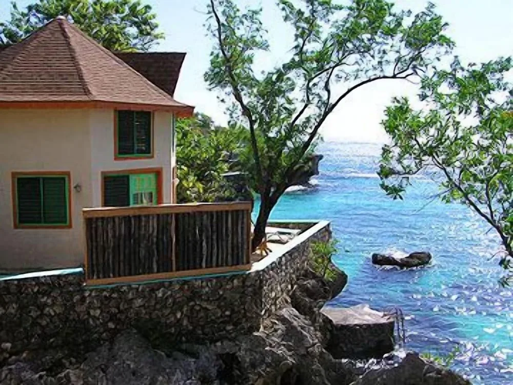 Xtabi Resort cliffside hotel with cave access and Negril West End ocean views