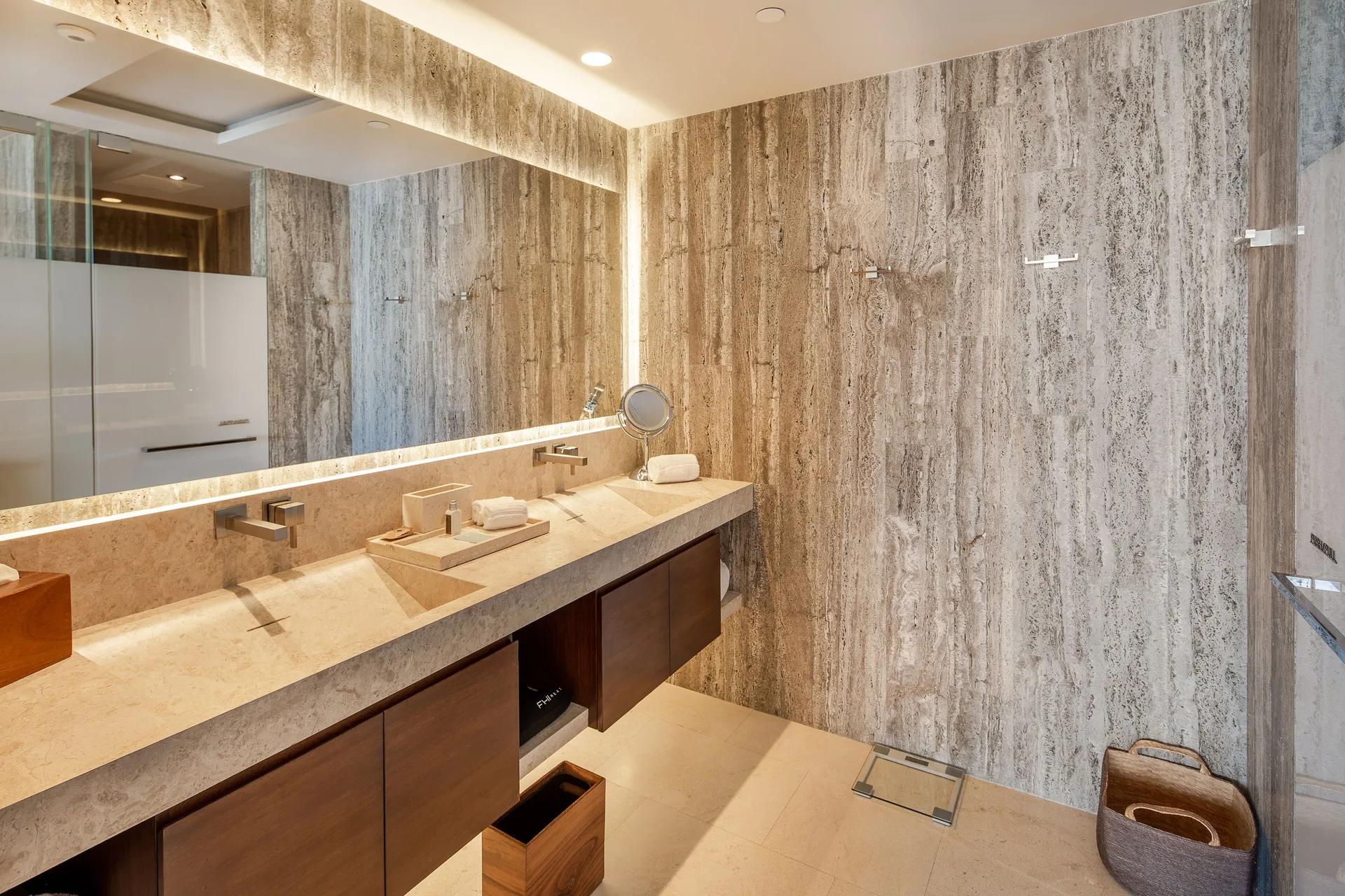 Stone bathroom vanity with double sinks at The Club at Solaz.