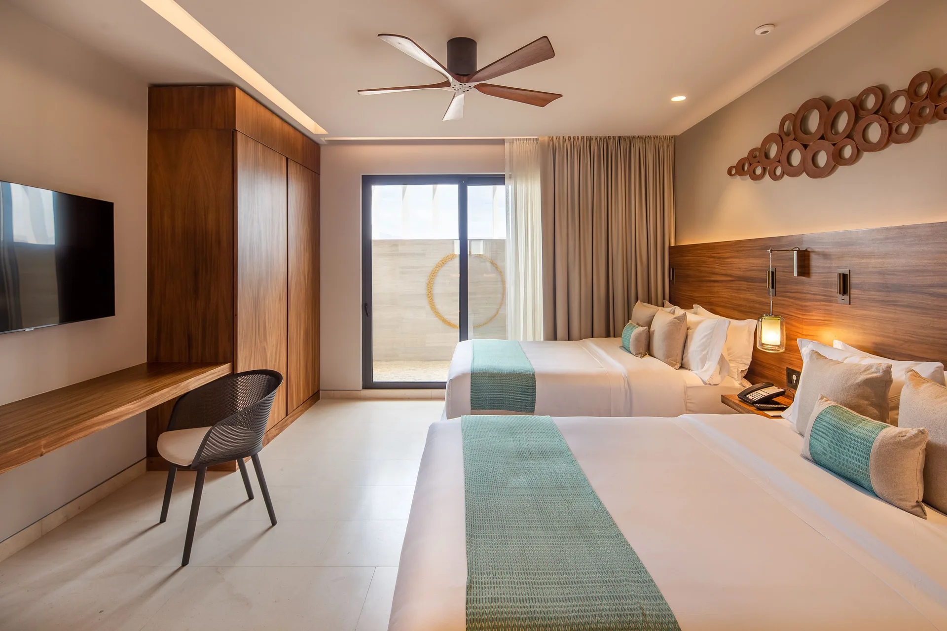 Two Bedroom Villa Ocean View bedroom with two beds at The Club at Solaz.