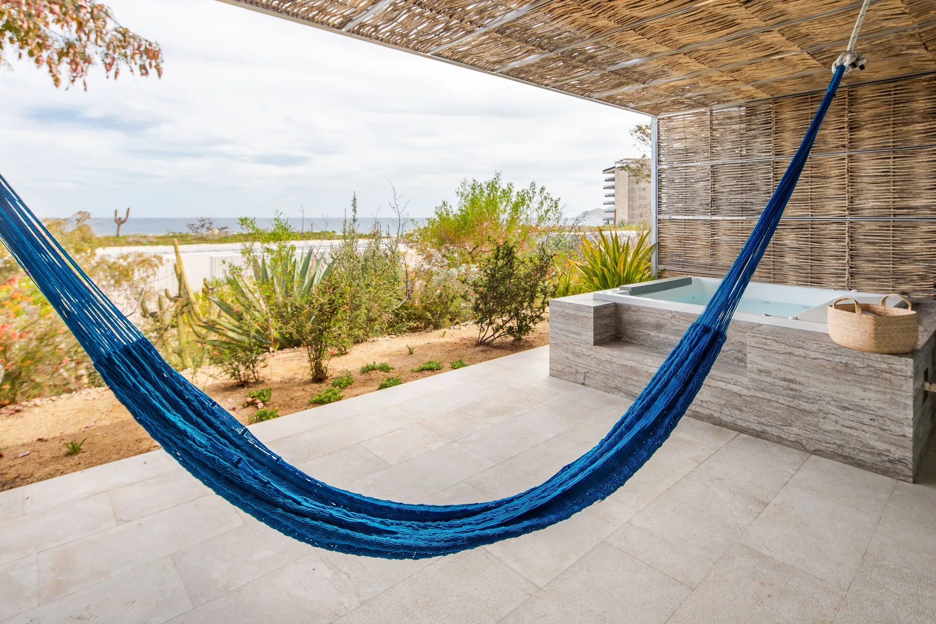 Private terrace with hammock and hot tub at The Club at Solaz.