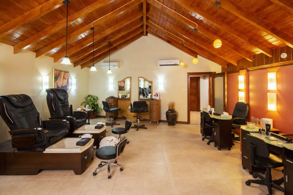 Spa salon pedicure chairs and manicure stations at The Club, Barbados Resort & Spa.